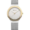 Bering Klassische Damenuhr in poliertem Silber mit Silbernem Netzarmband und goldenen Details