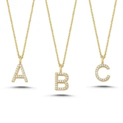 Buchstabenanhänger aus 14 kt Gold mit insgesamt 0,035 - 0,115ct
