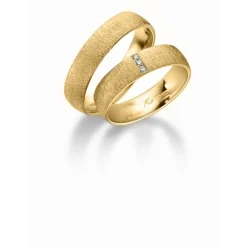 Gerstner - Trauringe aus 14kt. Gold mit 3 Diamanten mit Brillantschliff von insgesamt 0,024ct.