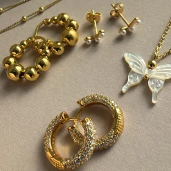 MerlePerle - Casie reitet auf vergoldete silber