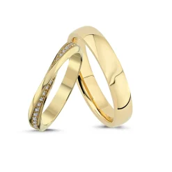 Nuran - Eheringe aus 14-karätigem Gold mit Diamanten von insgesamt 0,20 Karat