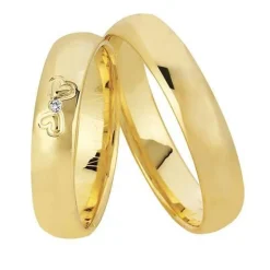 Nuran - Trauringe aus 8-14kt. Rotgold mit 1 Brillant und zwei Herzen im Damenring