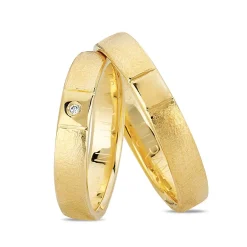 Nuran - Trauringe aus 8-14kt. Rotgold mit 1 Brillant im Damenring