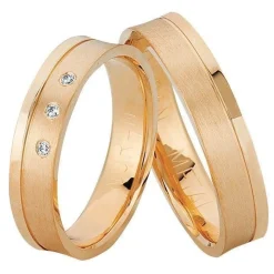 Nuran - Trauringe aus 14kt. Roségold mit 3 Diamanten im Damenring