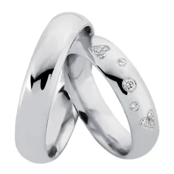 Rhodinierte Eheringe aus Silber mit 9 Diamanten im Damenring