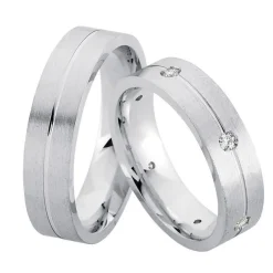 Rhodinierte Eheringe aus Silber mit 6 Diamanten im Damenring