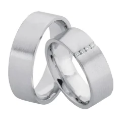 Rhodinierte Eheringe aus Silber mit 4 Diamanten im Damenring