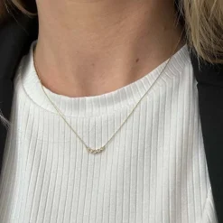 Siersbøl - Anhänger aus 14 kt. Gold mit einem Streifen aus Diamanten von insgesamt 0,015ct