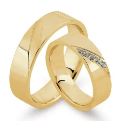 Trauringe aus 8 und 14 kt Gold von Nuran mit Diamanten 0,07 kt